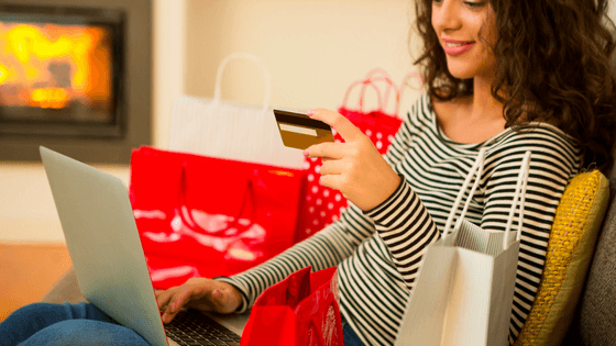 woman shopping online with credit card