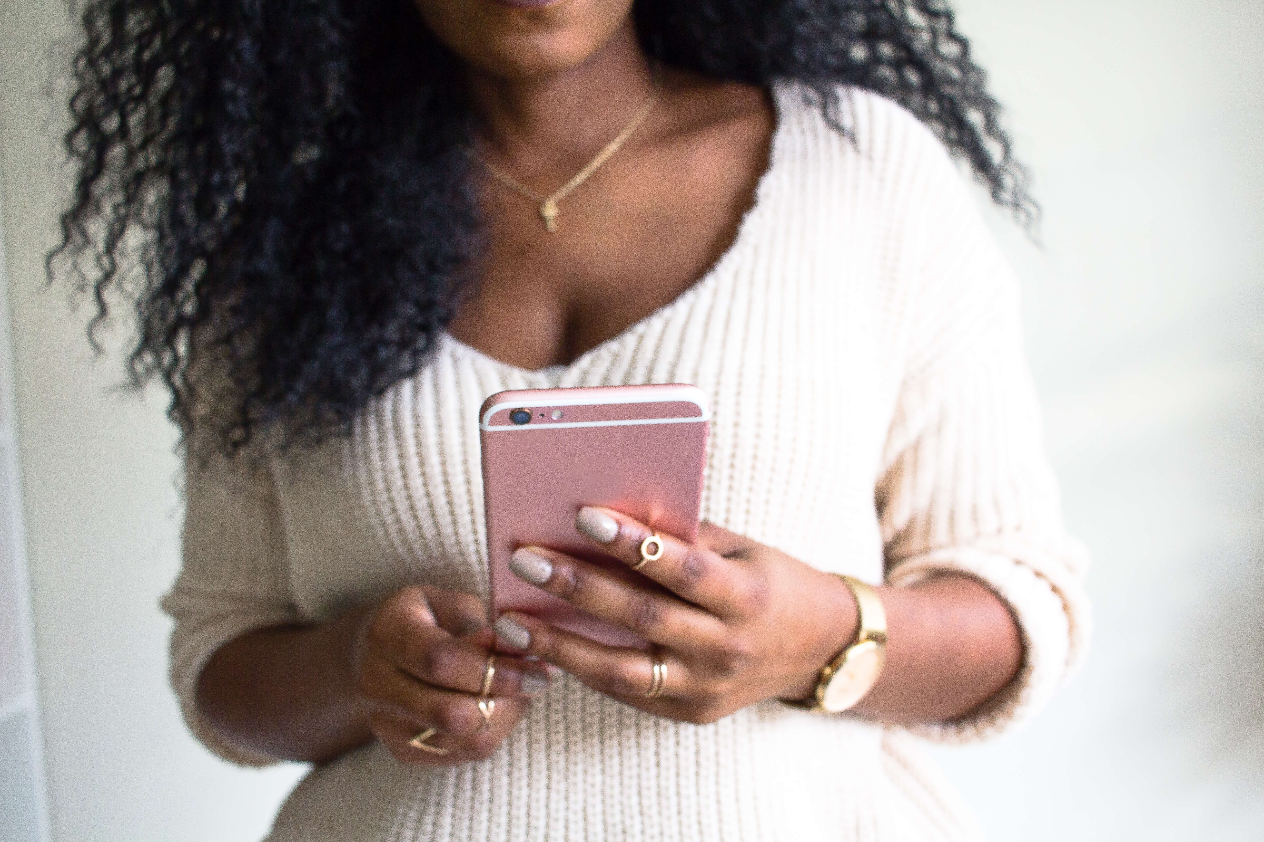 woman holding a cell phone