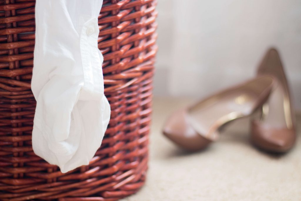 laundry basket with shoes near mom fail