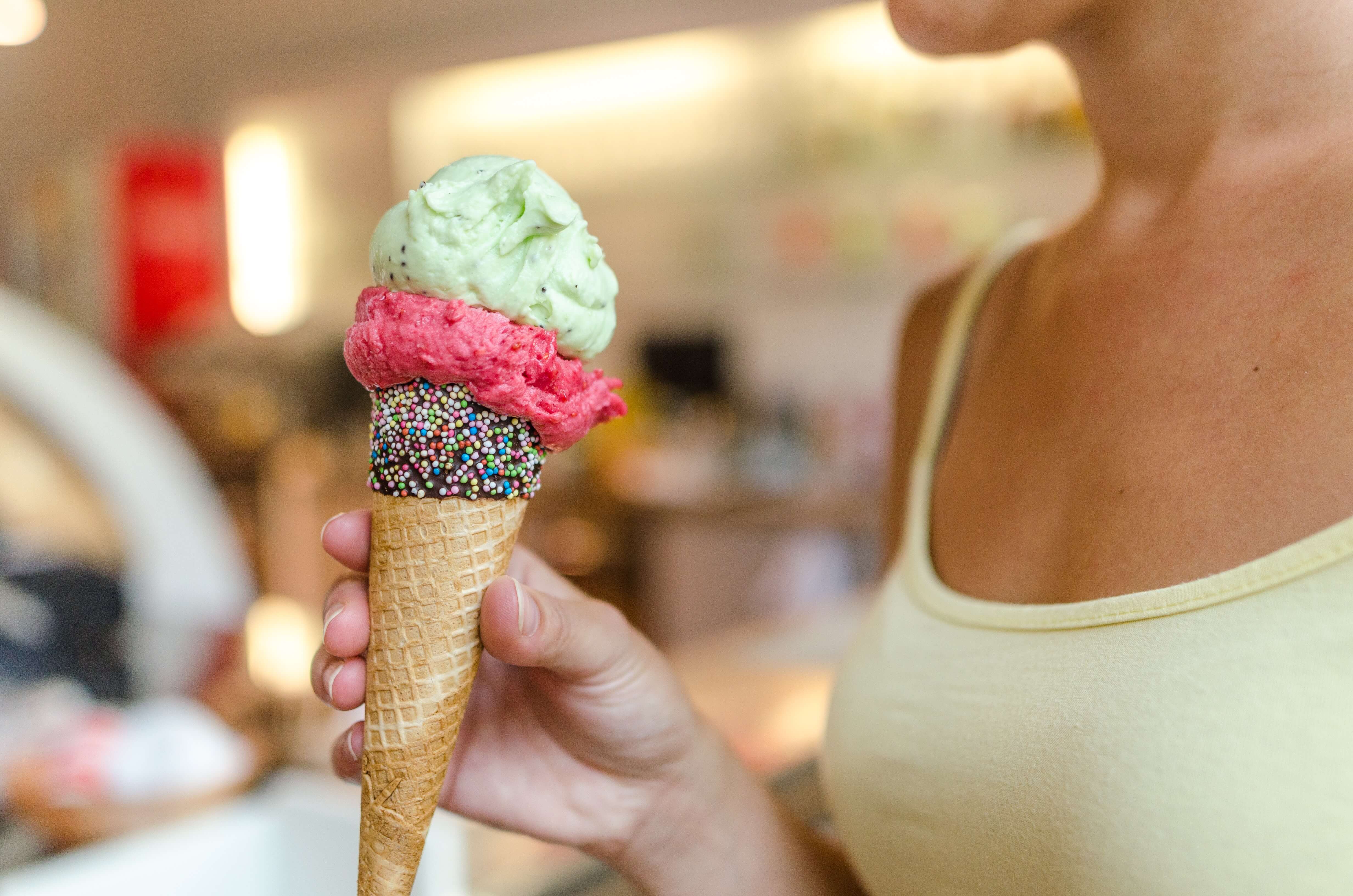 woman holding ice cream, activities for last days of summer