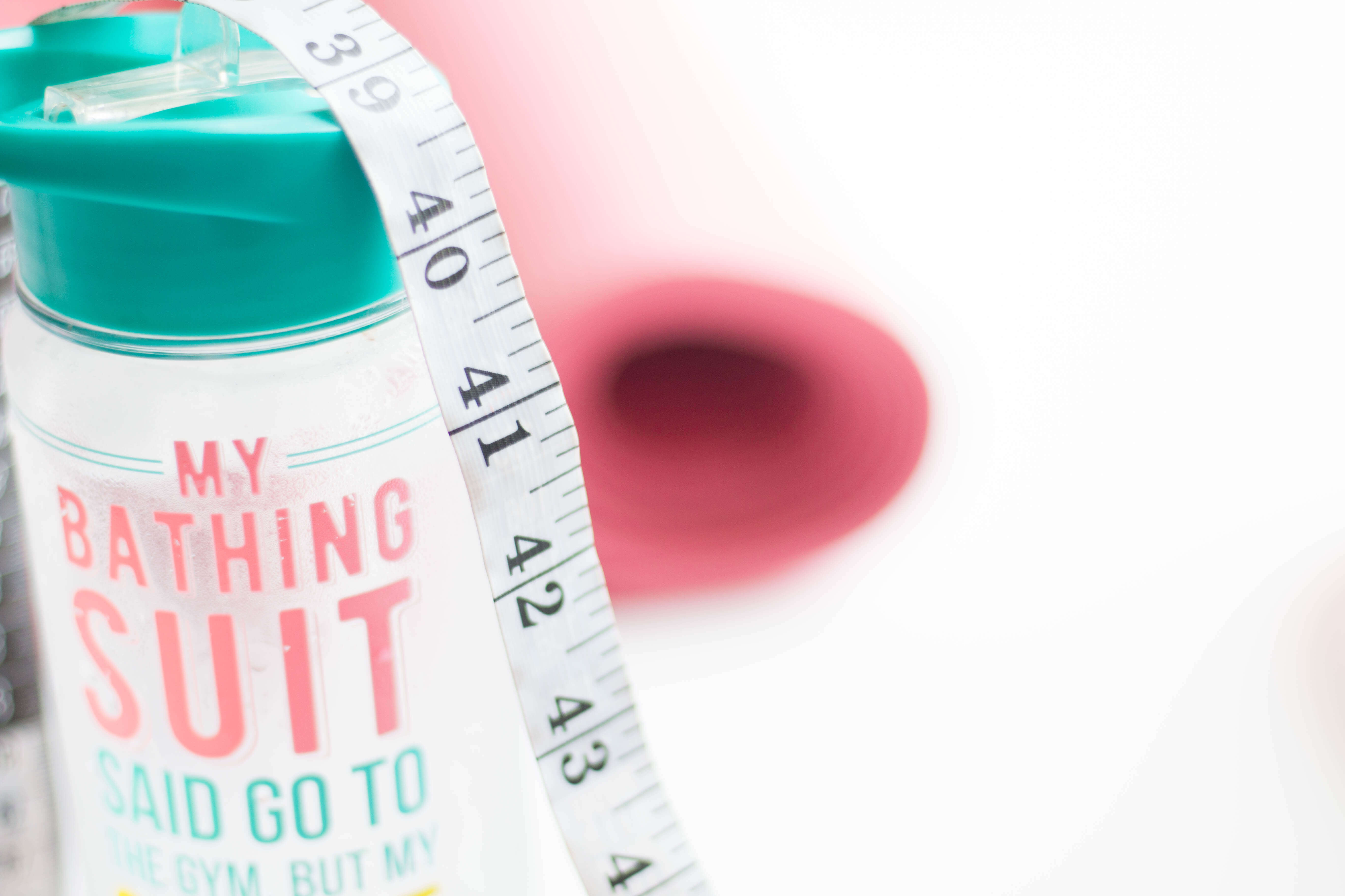 Water bottle and measuring tape. Luara from Mom Connection helps help moms lose weight and talking about why moms have a hard time losing weight.