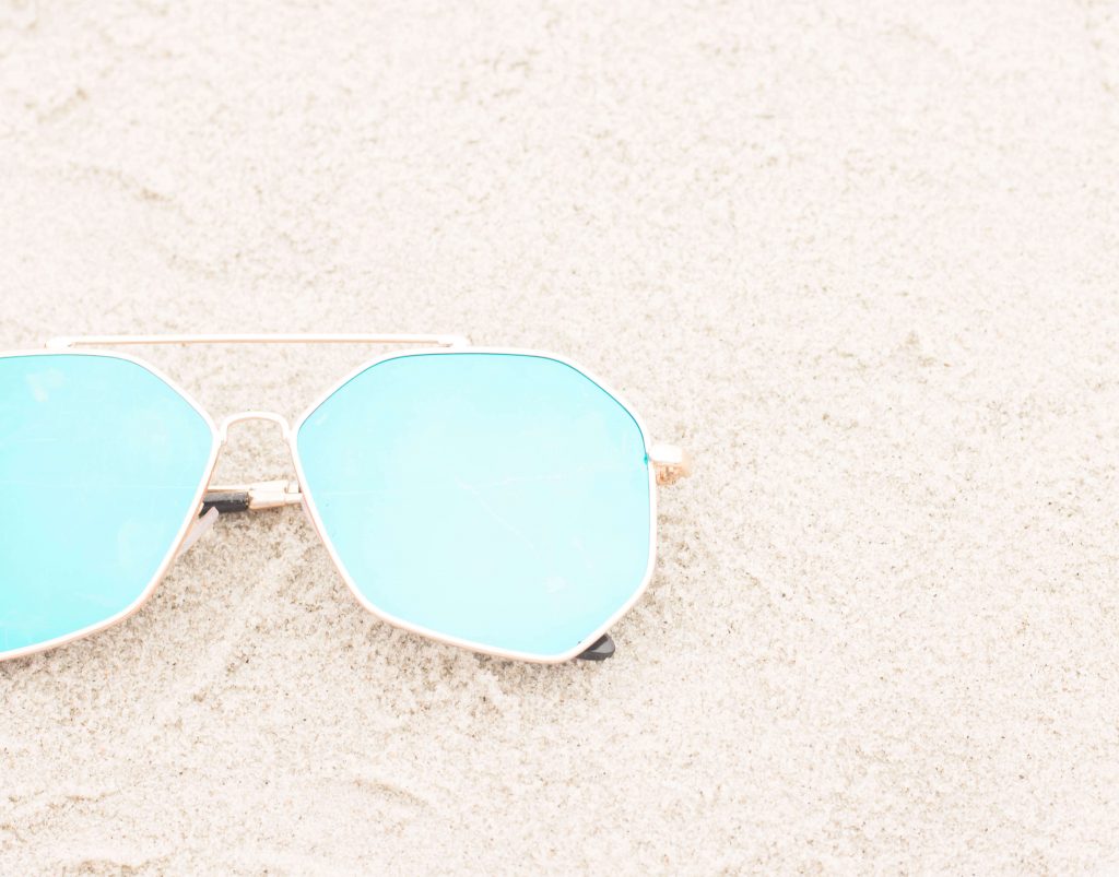 sun glasses on the beach